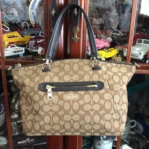 A coach handbag very good condition used smoke-free home strap shoulder missing